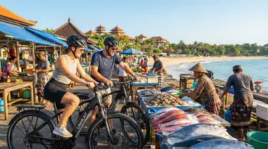 Discover Bali's Authentic Fish Markets by E-Bike: A Couple's Guide to Coastal Adventures