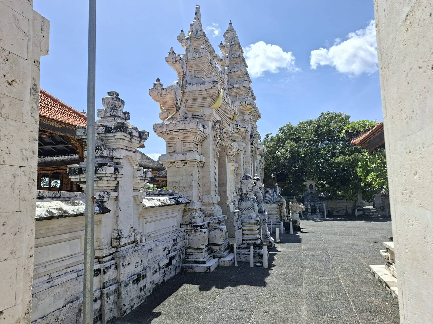 Private cultural moment at a Bali temple corridor